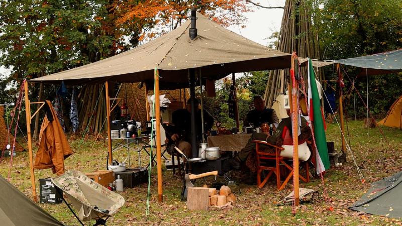 Tarp setup in the autumn forest